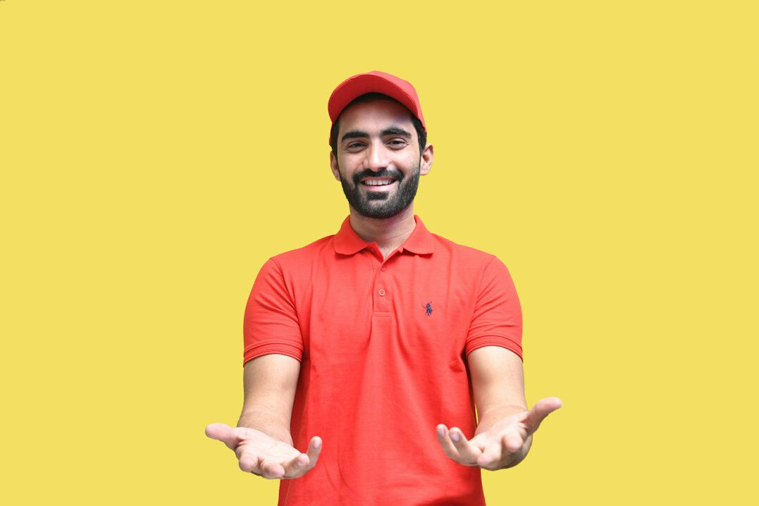 Studio portrait of an East Asian British man, content distribution manager